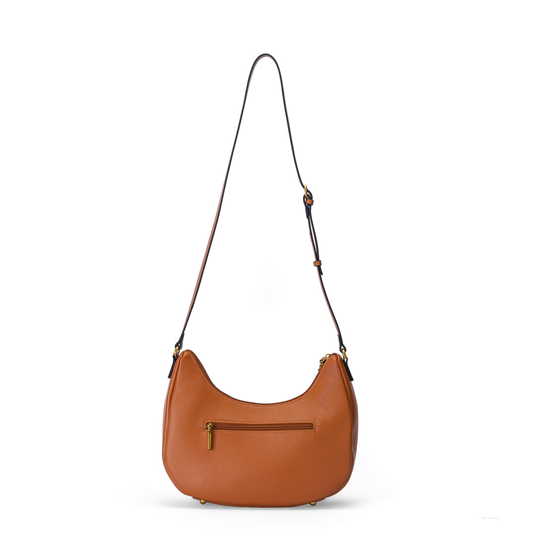 Grand sac demi-lune Inès cuir de vachette cognac, bandoulière réglable 30–60 cm, finitions dorées