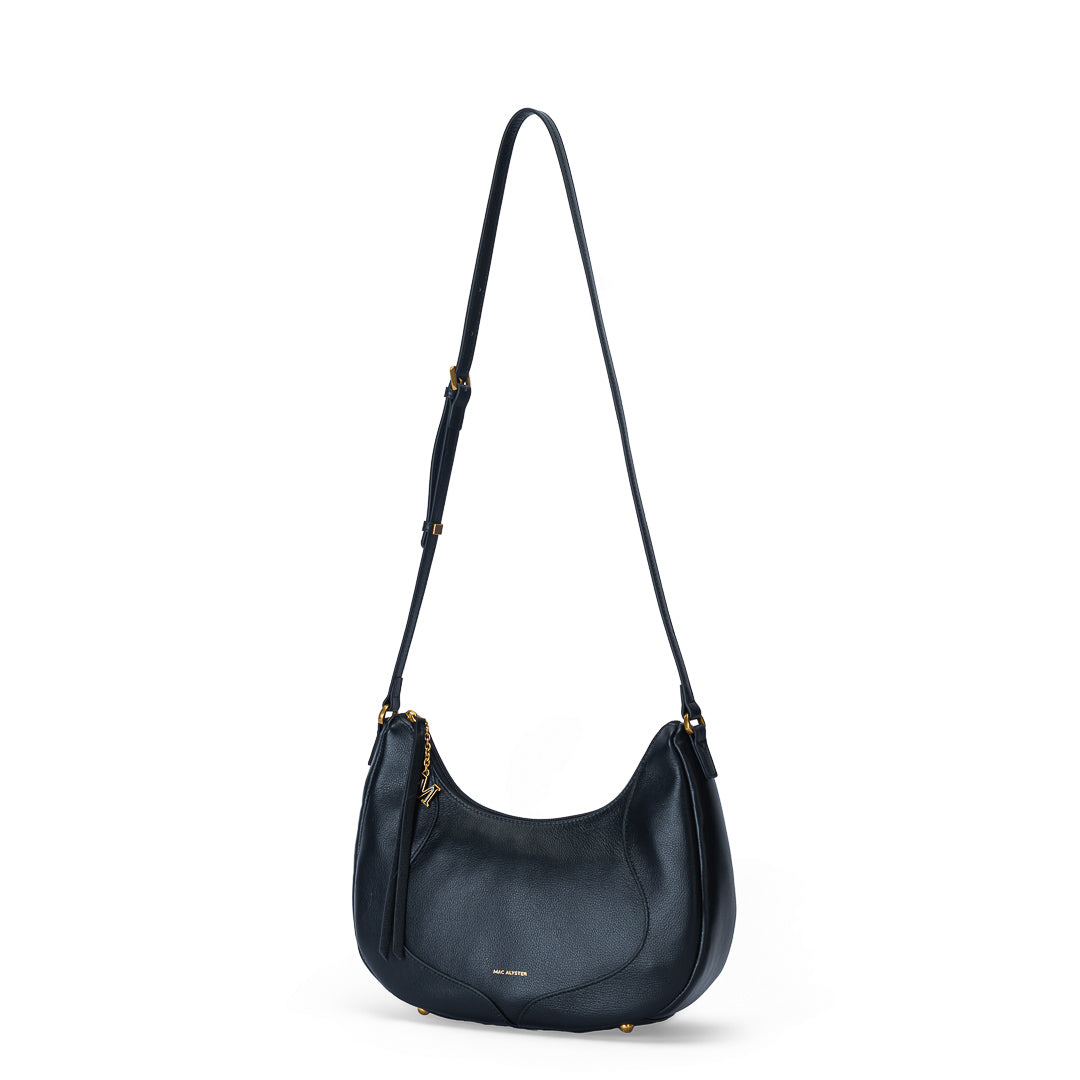 Grand sac demi-lune Inès cuir de vachette noir, fermeture zippée, porté travers finitions dorées