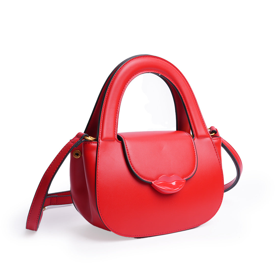 Sac à main BISOUS en cuir synthétique ROUGE de trois-quarts