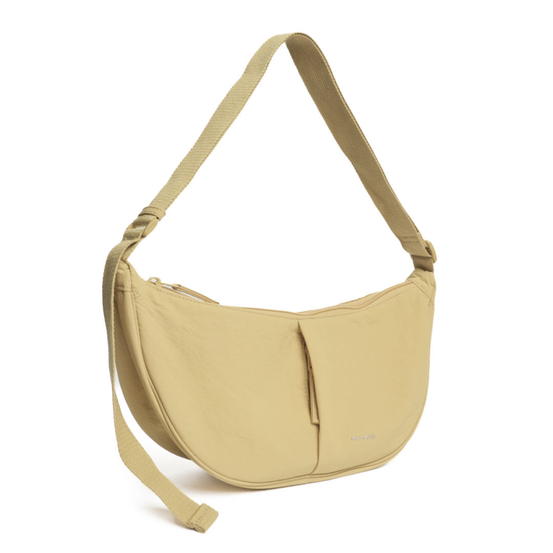 Sac demi-lune PLUME en matière synthétique BEIGE de trois-quarts